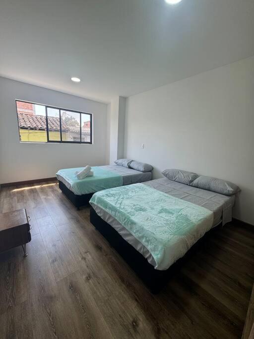 Postel nebo postele na pokoji v ubytování Apartamento en Sonsón