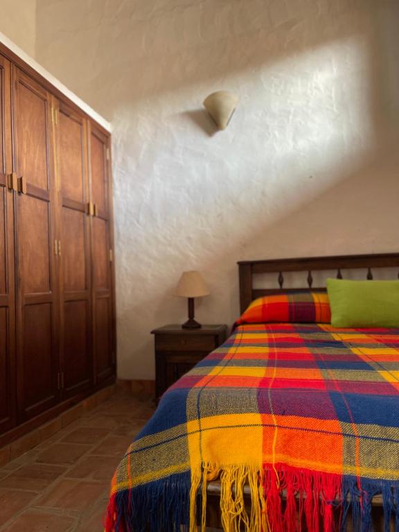 Postel nebo postele na pokoji v ubytování Casa Raiz