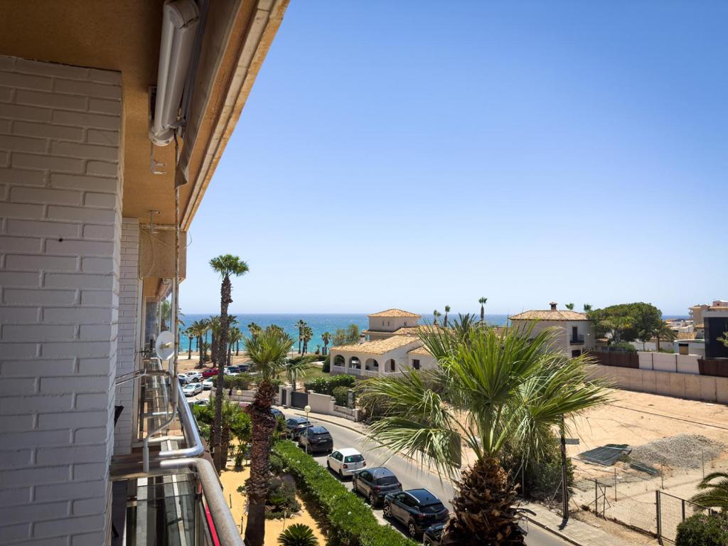 a view of a street from a balcony of a building at Beachfront Apartment Primera Línea 2-04 in Orihuela Costa