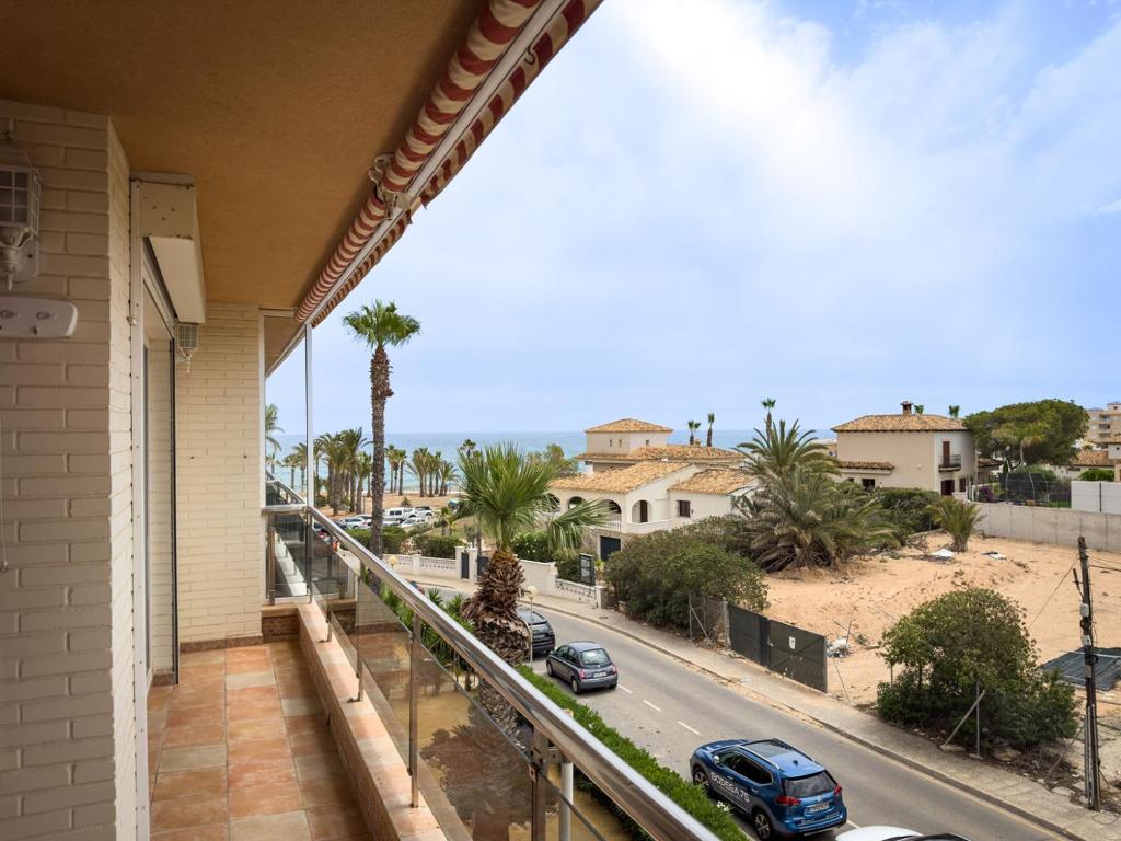 a balcony of a house with a view of a street at Beachfront Apartment Primera Línea 2-06 in Orihuela