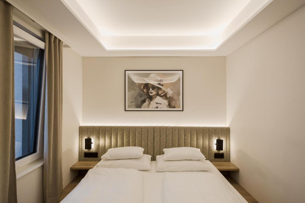 Postel nebo postele na pokoji v ubytování Hotel Schwarzer Bär