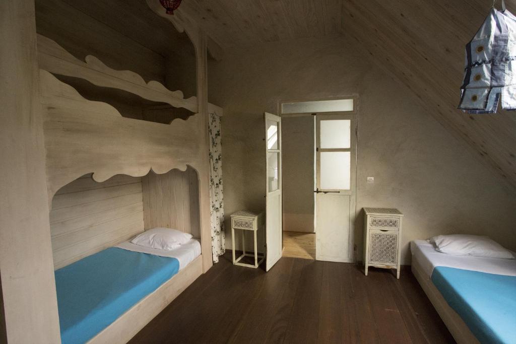 Postel nebo postele na pokoji v ubytování Villa Laurina