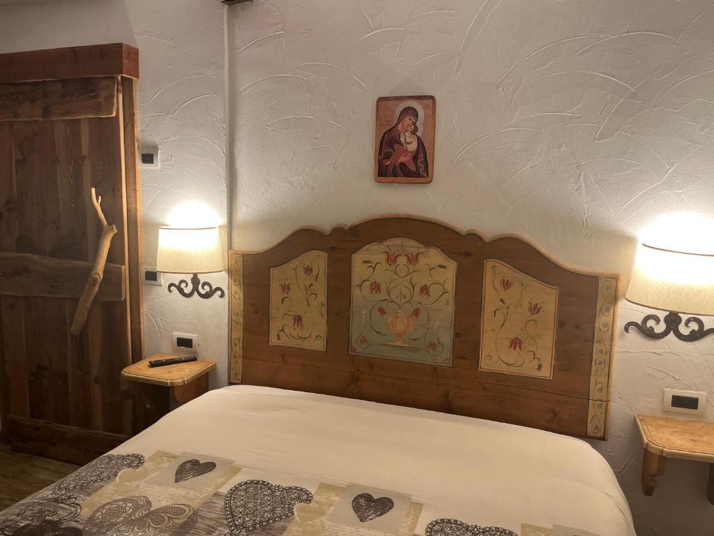 Łóżko lub łóżka w pokoju w obiekcie APPARTAMENT La locanda delle pulci Bio Welness