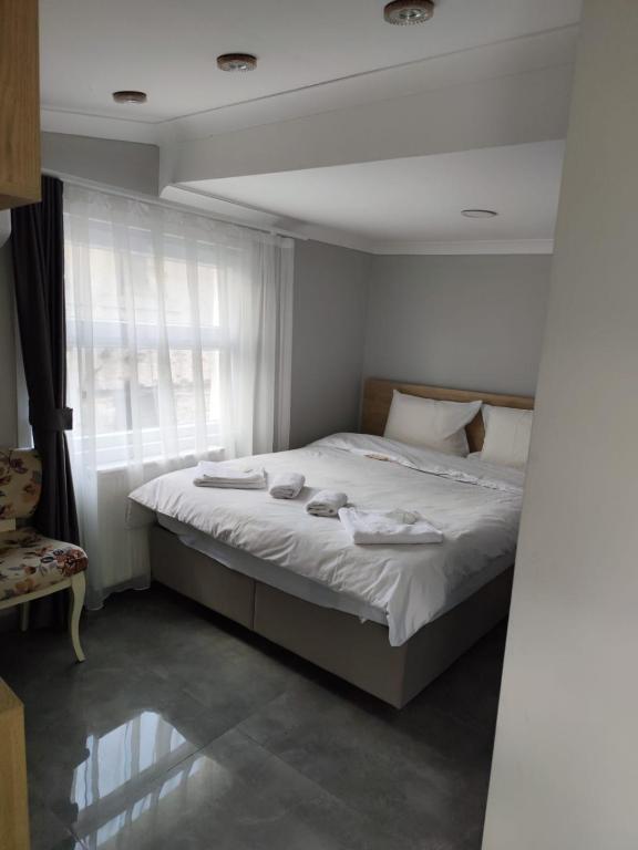 Postel nebo postele na pokoji v ubytování moonlight hotel