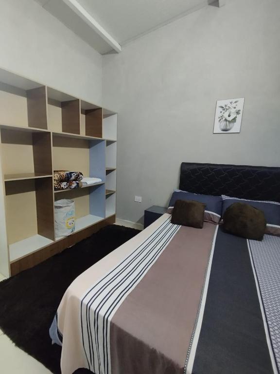Postel nebo postele na pokoji v ubytování LFA House