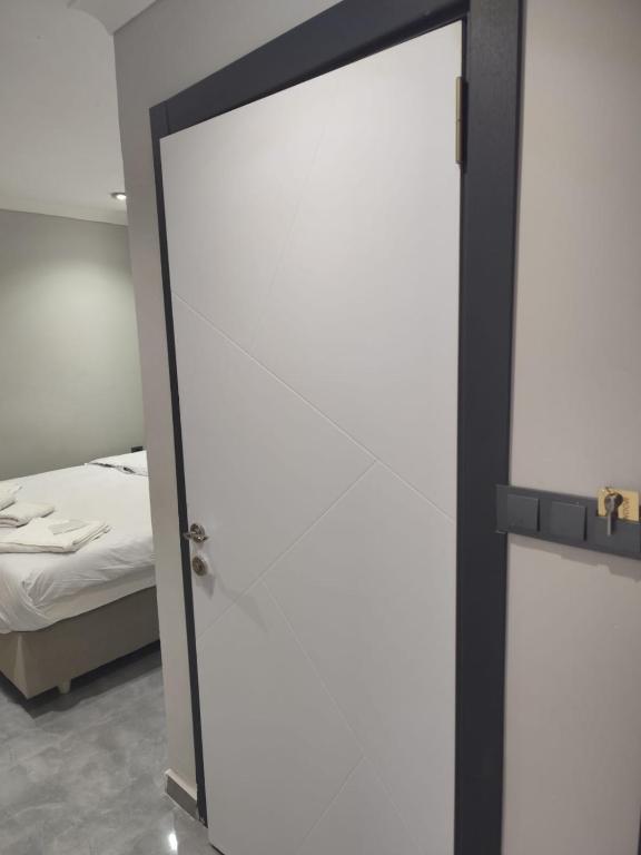 Postel nebo postele na pokoji v ubytování moonlight hotel
