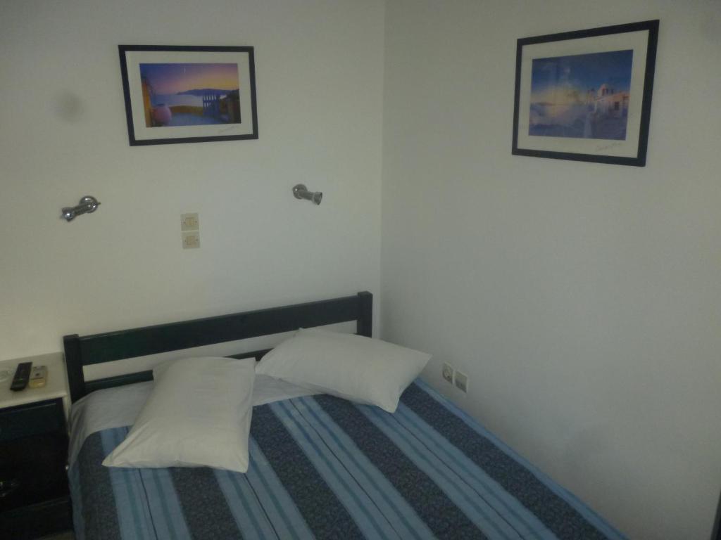 Postel nebo postele na pokoji v ubytování Rooms Mike Paros