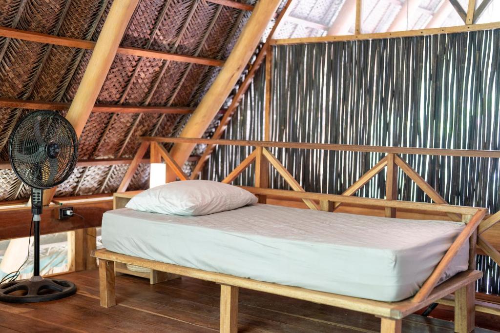 Postel nebo postele na pokoji v ubytování Canto Tayrona Ecolodges