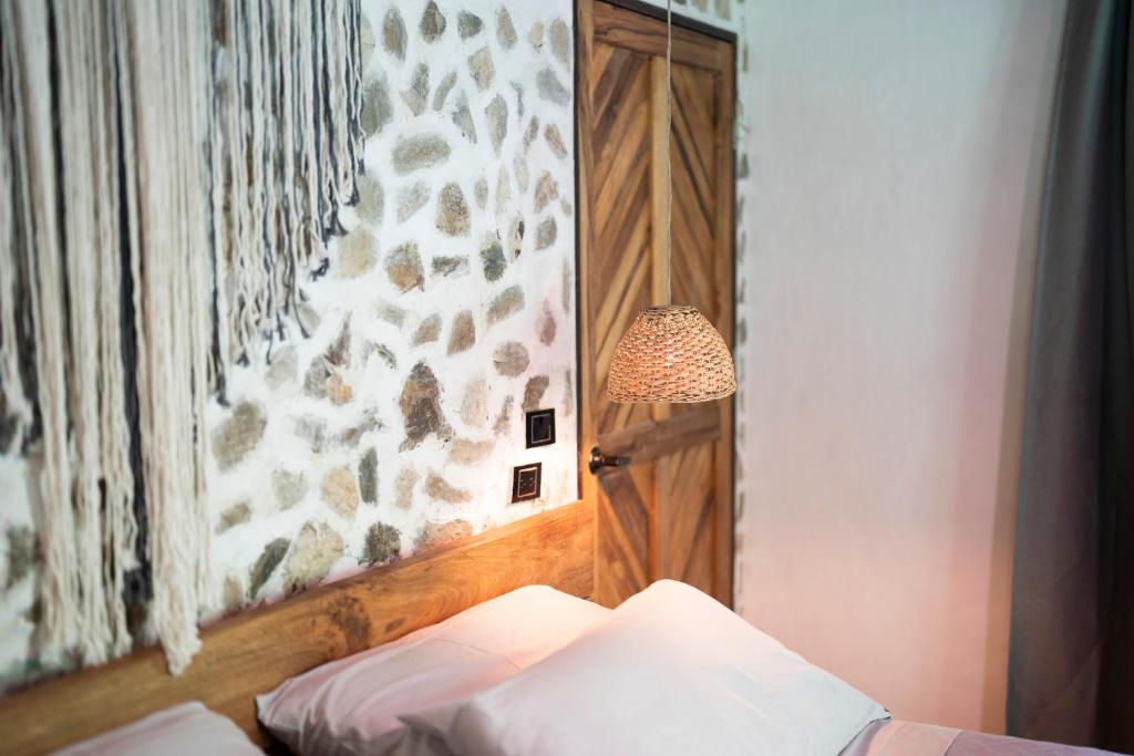 Postel nebo postele na pokoji v ubytování Canto Tayrona Ecolodges