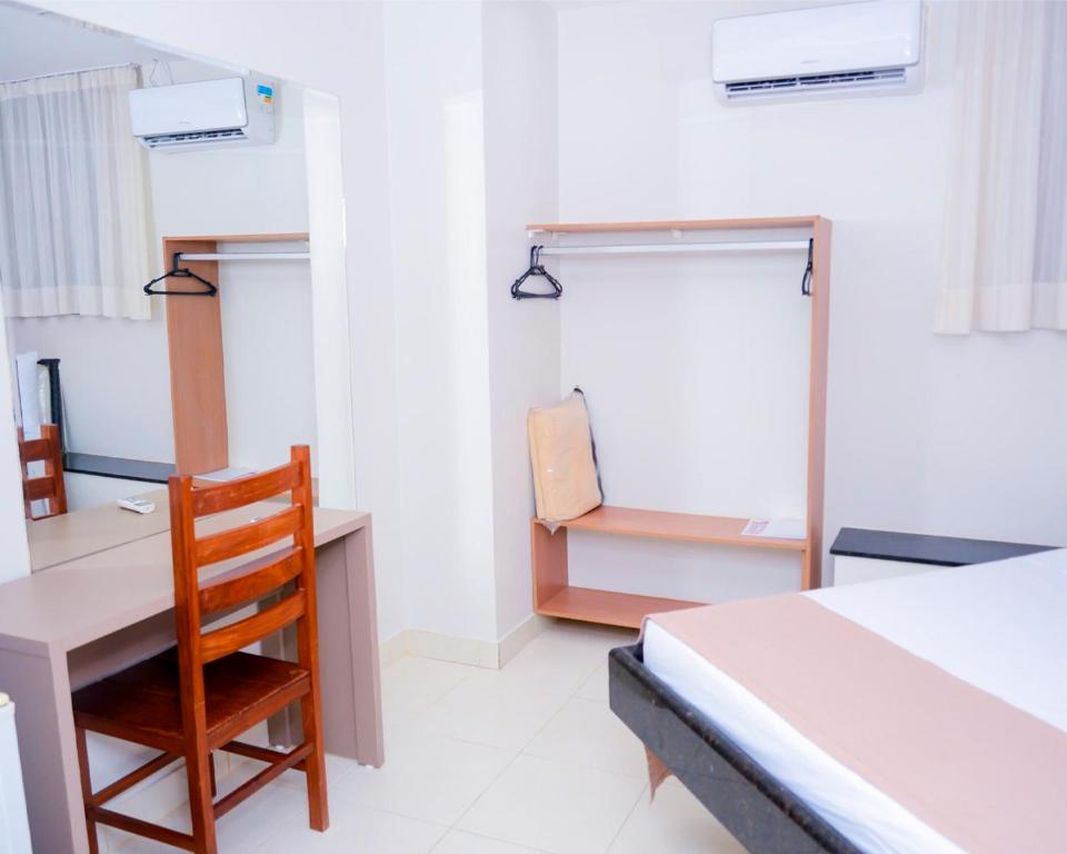 Postel nebo postele na pokoji v ubytování Hotel Sempre Bahia