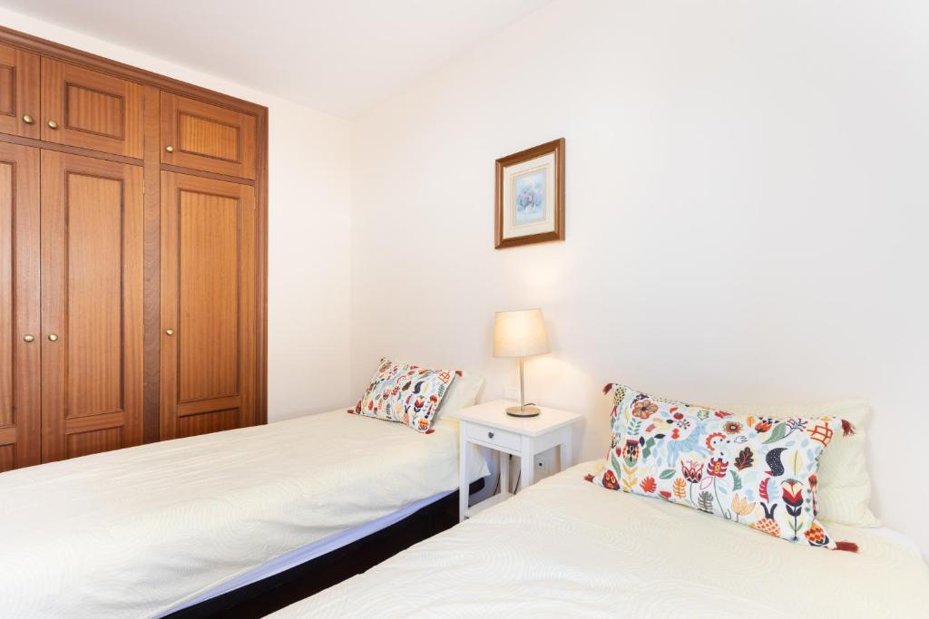 Postel nebo postele na pokoji v ubytování Azalea - vivienda vacacional