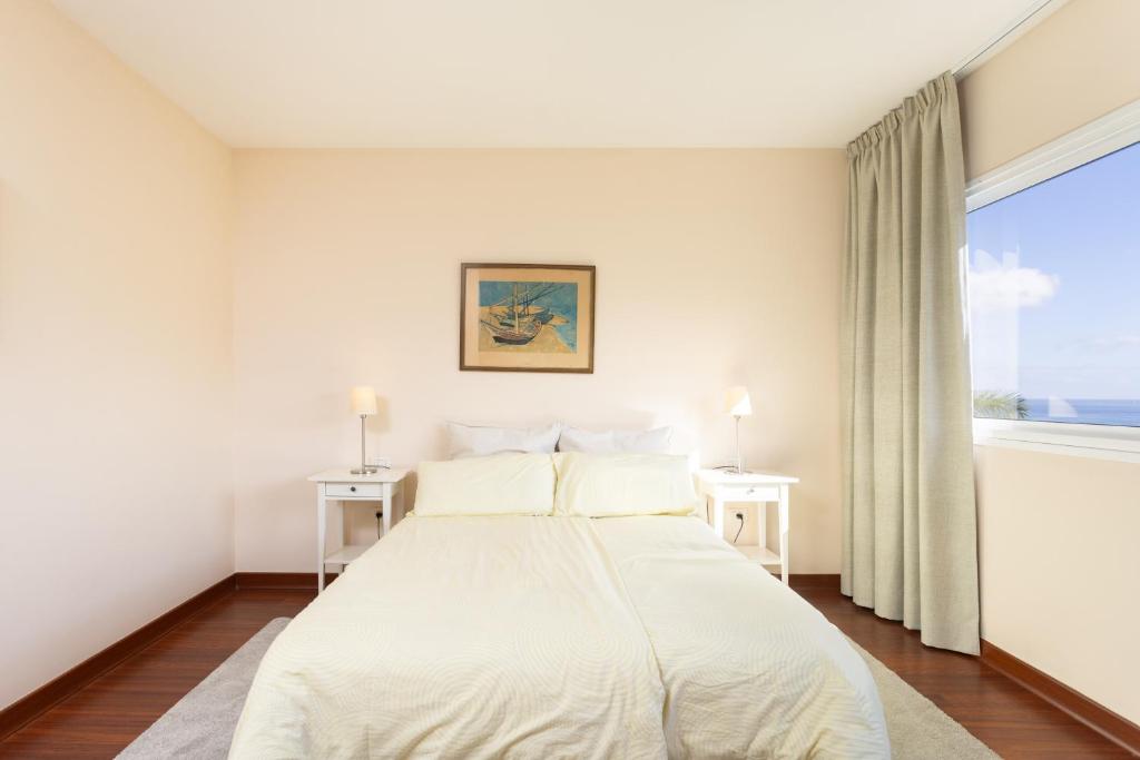 Postel nebo postele na pokoji v ubytování Azalea - vivienda vacacional