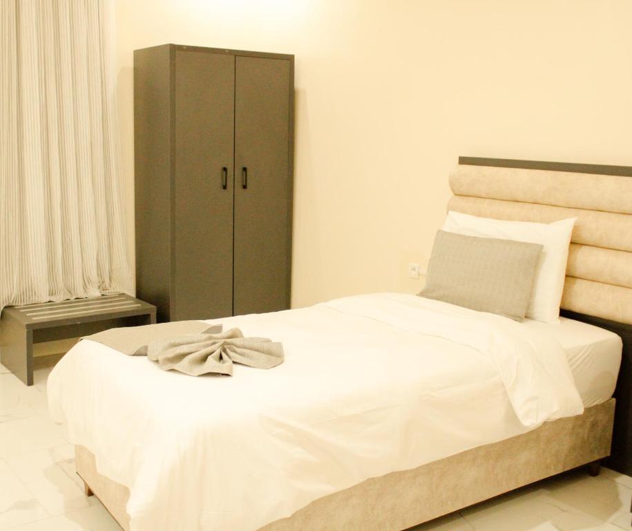 Postel nebo postele na pokoji v ubytování Urban Hotel Suites
