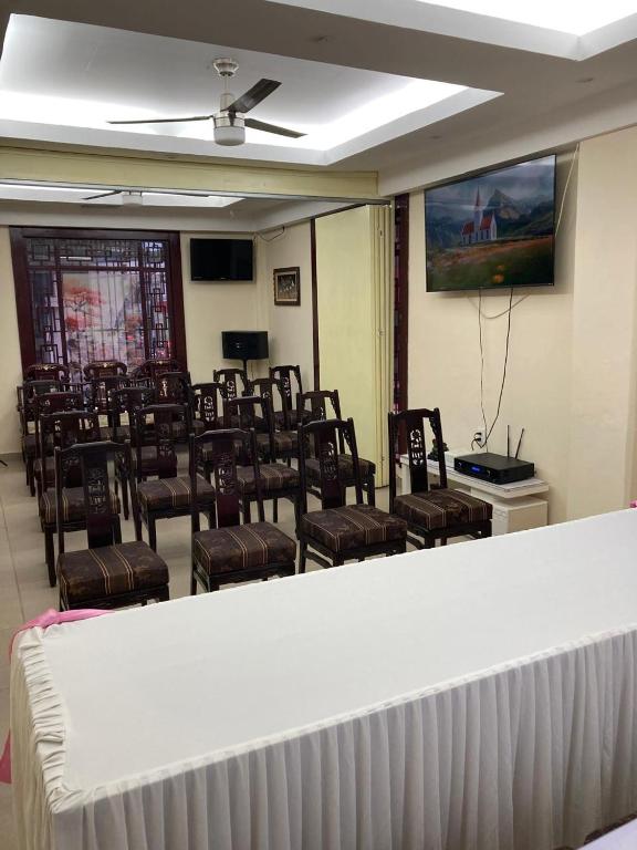 TV a/nebo společenská místnost v ubytování Hotel Mandarin