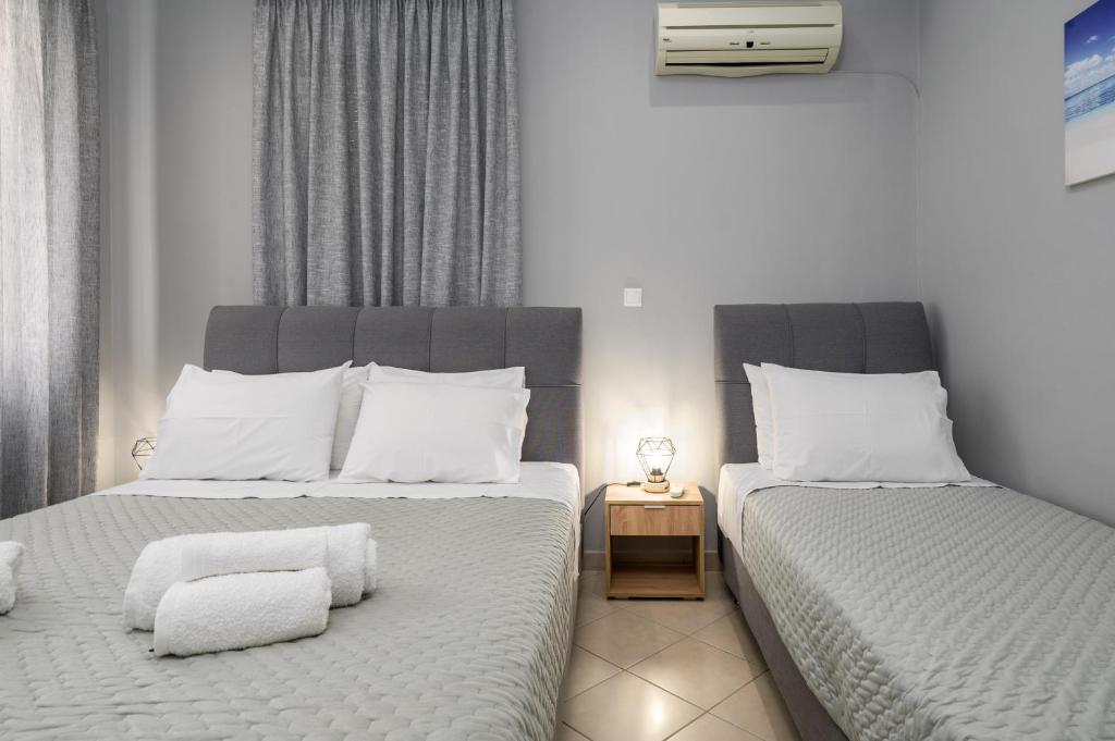 A bed or beds in a room at Casa Centrale ad Argostoli!