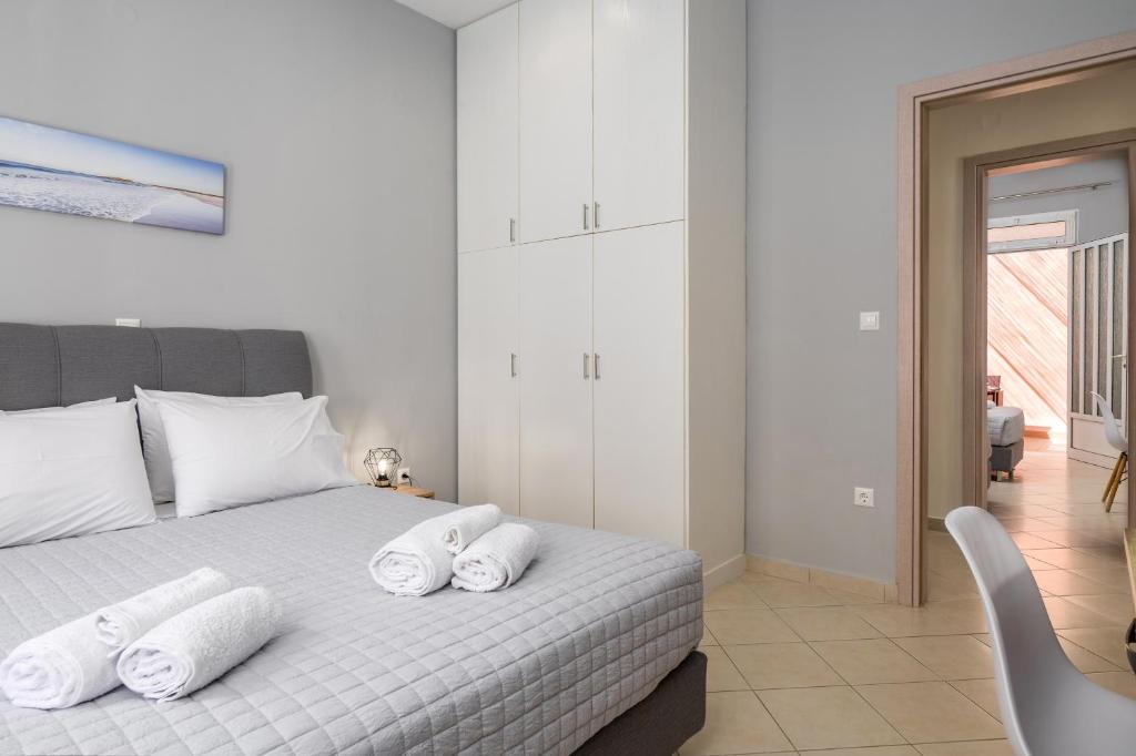 A bed or beds in a room at Casa Centrale ad Argostoli!