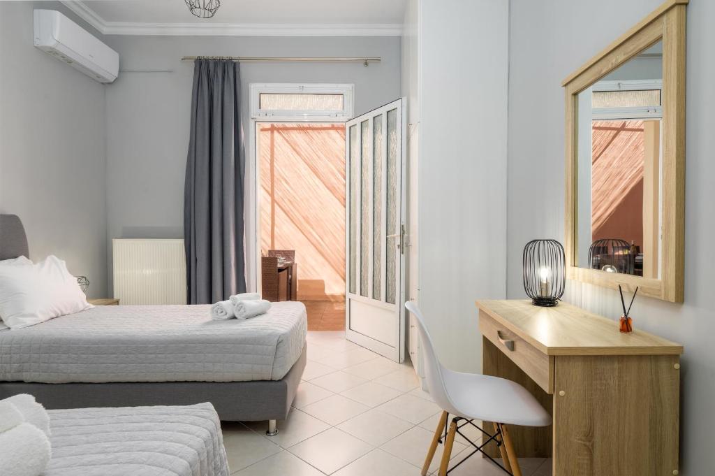 A bed or beds in a room at Casa Centrale ad Argostoli!