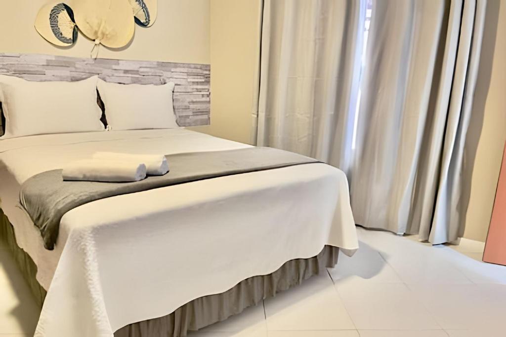 Voodi või voodid majutusasutuse Pousada Villa Preguiças - Chalés e Recepções toas