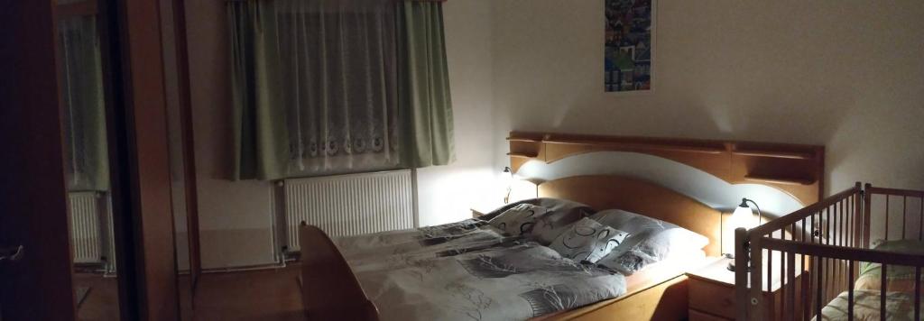 Postel nebo postele na pokoji v ubytování Apartment Bajt