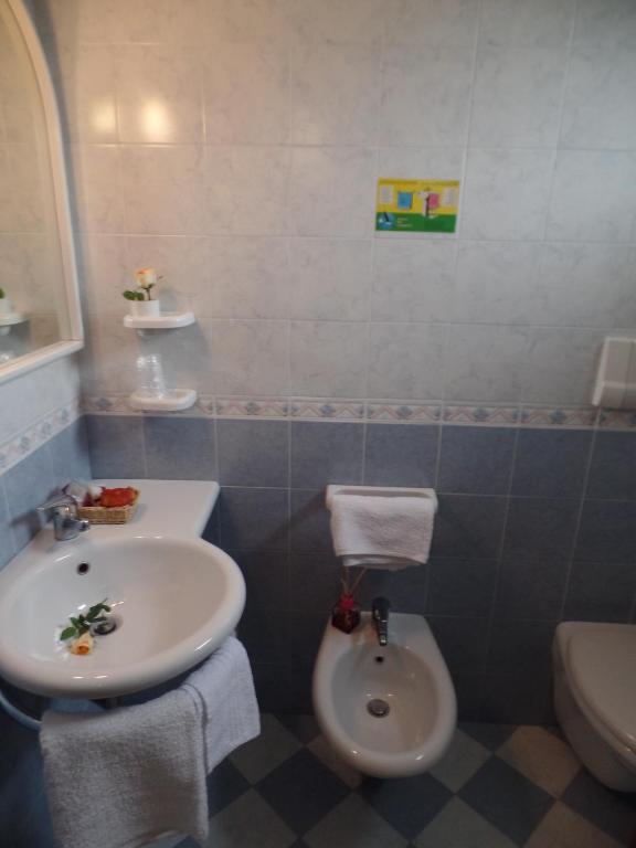 Koupelna v ubytování Hotel Picobello Pineta