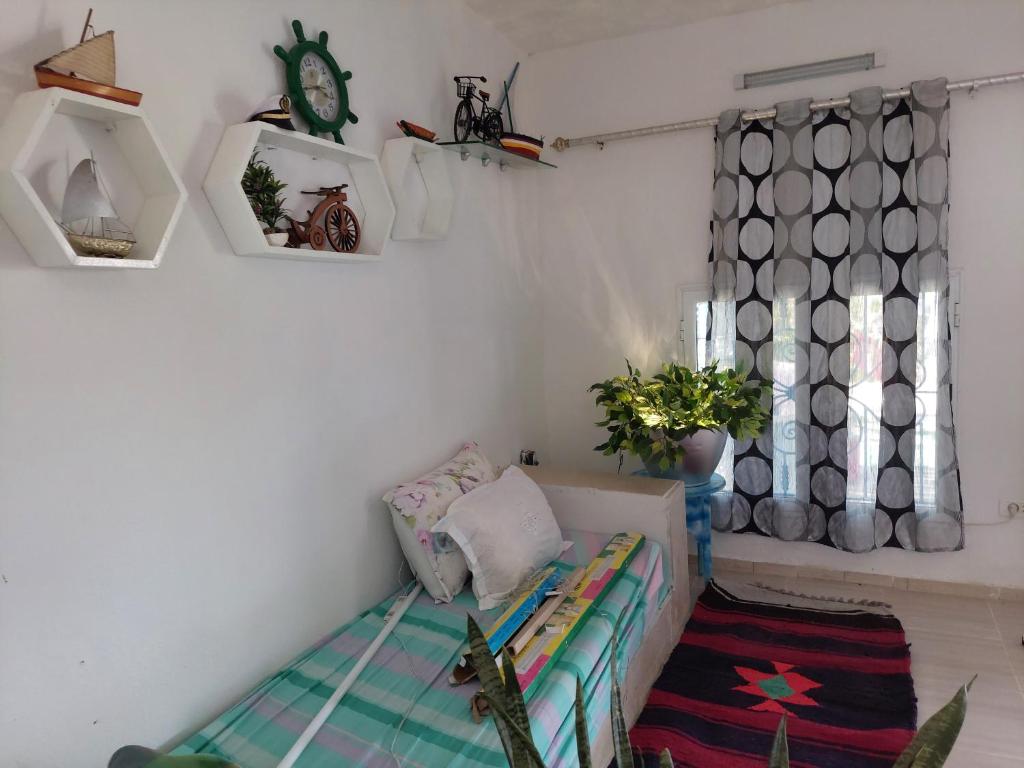 Postel nebo postele na pokoji v ubytování Slim's House - Sea View Cabana