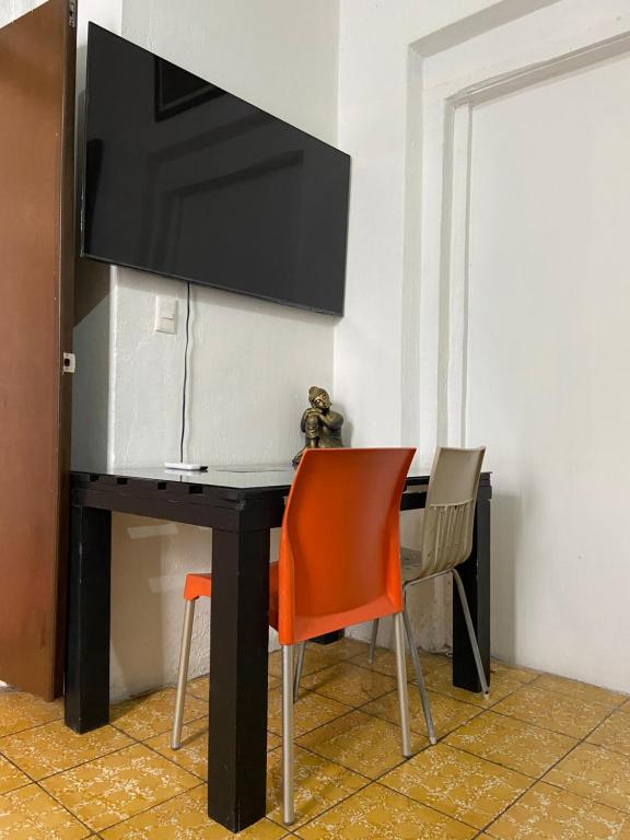 TV a/nebo společenská místnost v ubytování Hostal Centeno