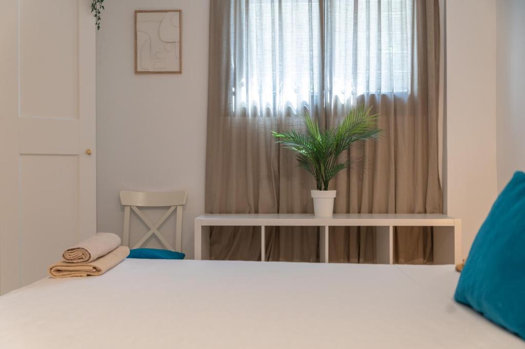 Posteľ alebo postele v izbe v ubytovaní Urban Chic Loft Malaga City Center