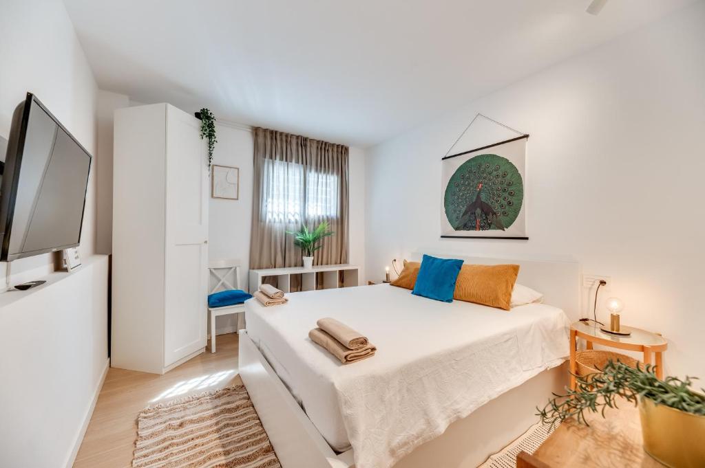 Televízia a/alebo spoločenská miestnosť v ubytovaní Urban Chic Loft Malaga City Center