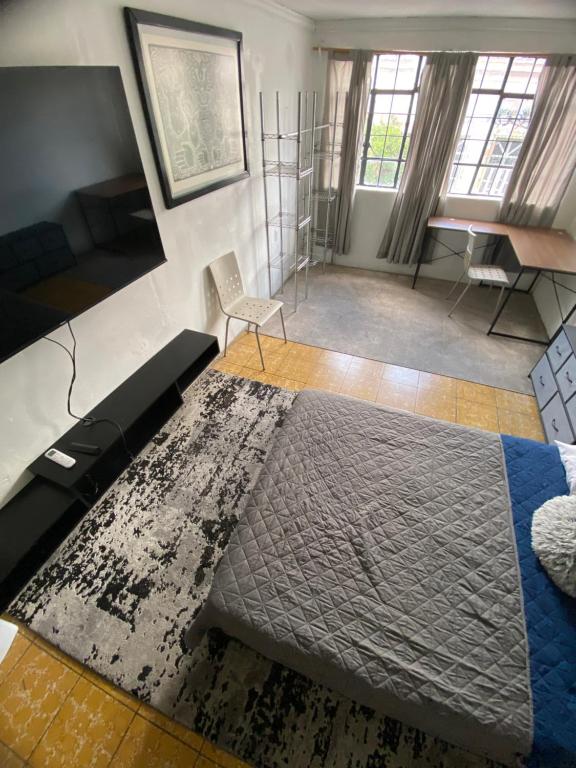 TV a/nebo společenská místnost v ubytování Hostal Centeno