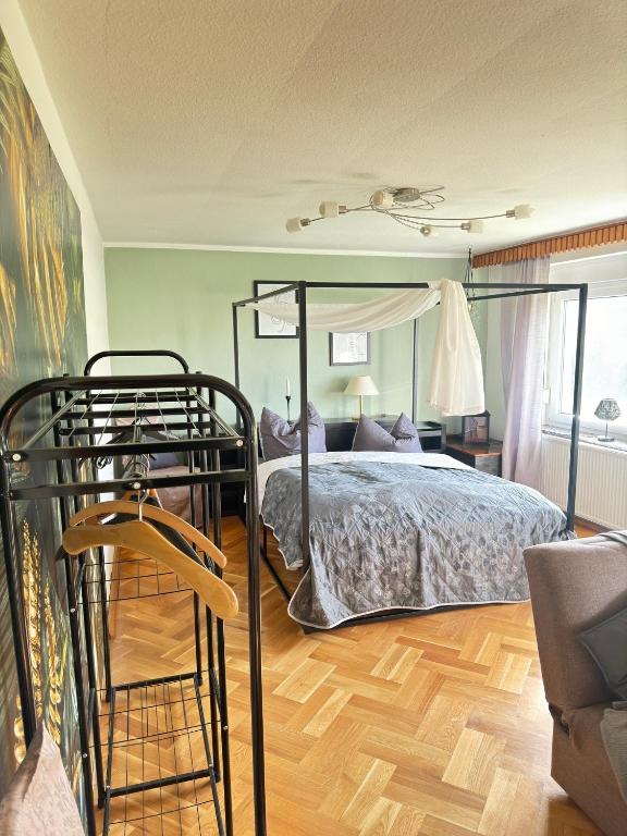 Postel nebo postele na pokoji v ubytování Pension FAULPELZ - Apartment mit Küche, Badewanne