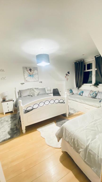 Postel nebo postele na pokoji v ubytování Sonas House
