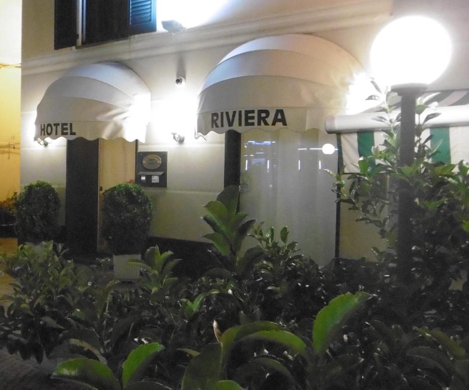 a building with a sign that reads rivera at Hotel Riviera in Arenzano