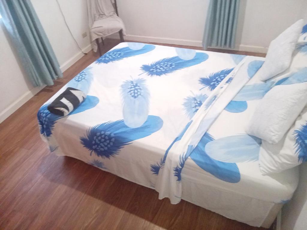 Postel nebo postele na pokoji v ubytování Chandler Homestay