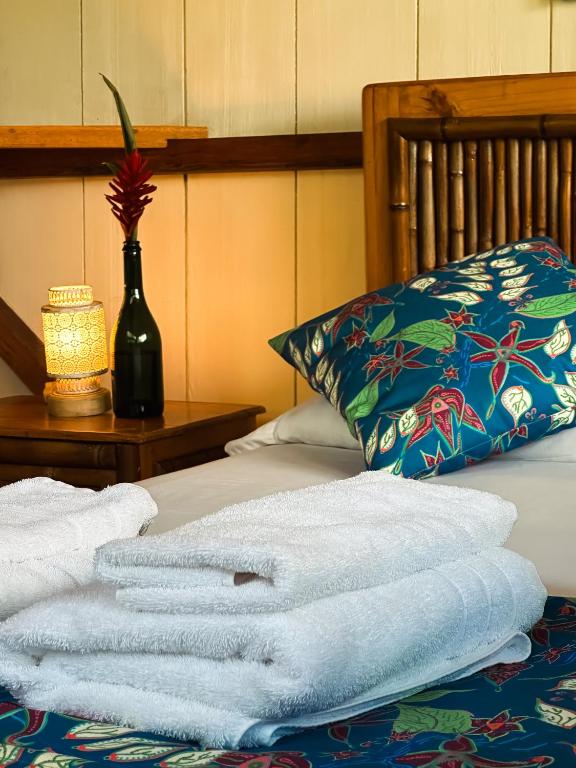 Postel nebo postele na pokoji v ubytování Hotel El Abrazo del Arbol