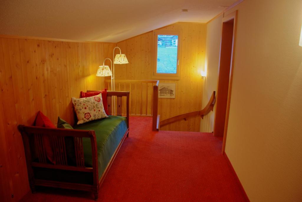 Postel nebo postele na pokoji v ubytování Hotel Garni Hostatt