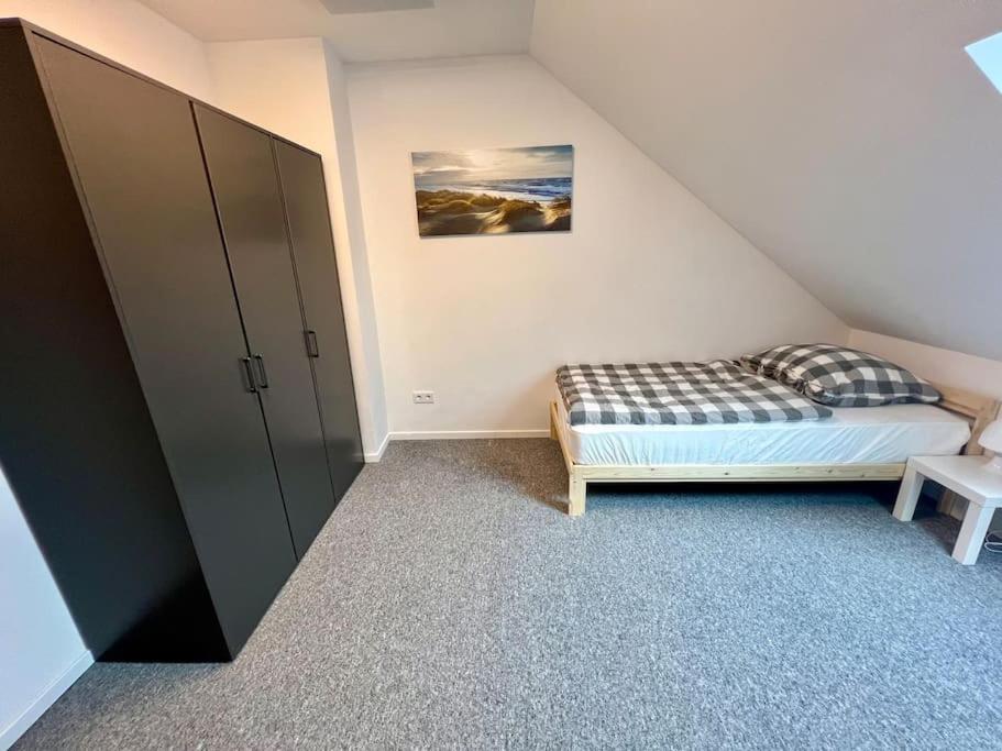 Postel nebo postele na pokoji v ubytování Ferien- Monteurwohnung 301 Diwo Dillingen