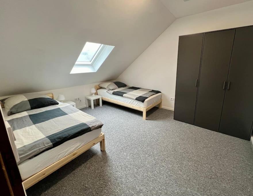 Postel nebo postele na pokoji v ubytování Ferien- Monteurwohnung 301 Diwo Dillingen