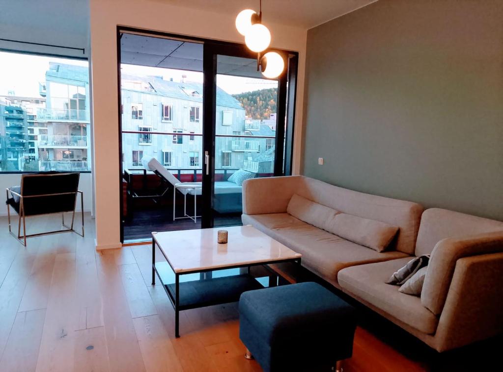 Posezení v ubytování BEACHFRONT LUXURY VIP ROOM BY CENTRAL STATION Oslo