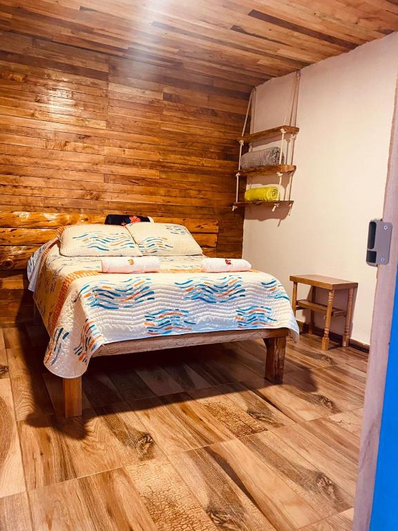 Ένα ή περισσότερα κρεβάτια σε δωμάτιο στο Hotel Areca