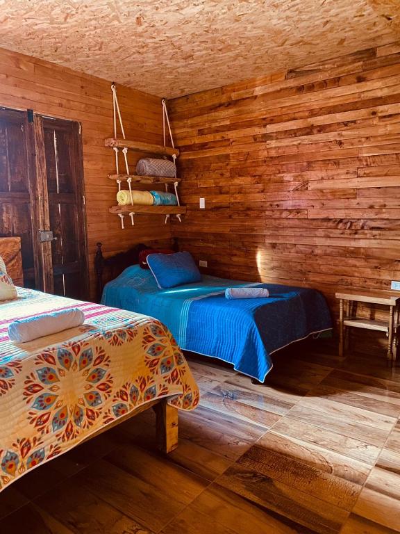 Ένα ή περισσότερα κρεβάτια σε δωμάτιο στο Hotel Areca