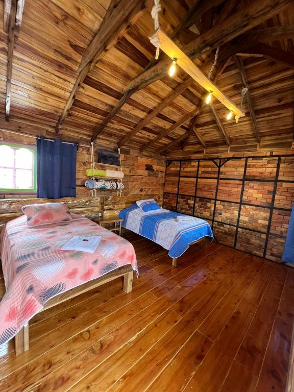 Ένα ή περισσότερα κρεβάτια σε δωμάτιο στο Hotel Areca