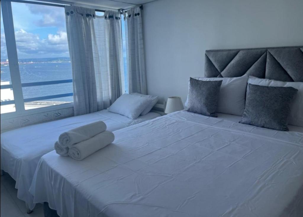 Кровать или кровати в номере Nuevo Conquistador piso 17