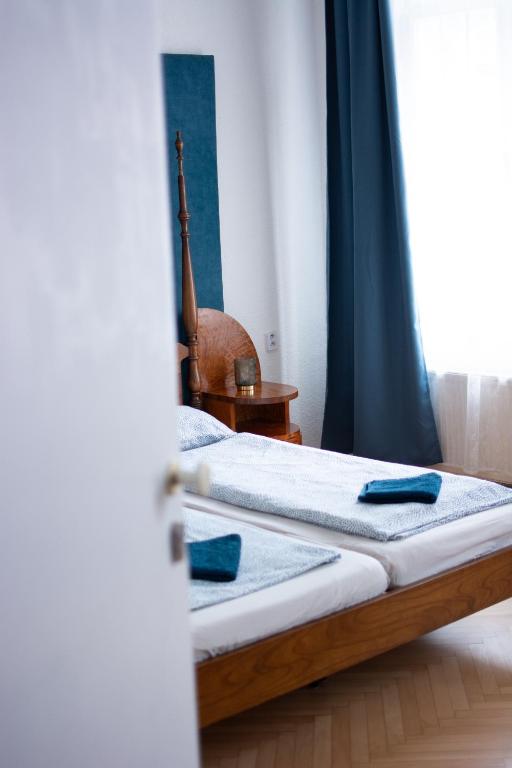 Postel nebo postele na pokoji v ubytování Hostel Moravia Ostrava