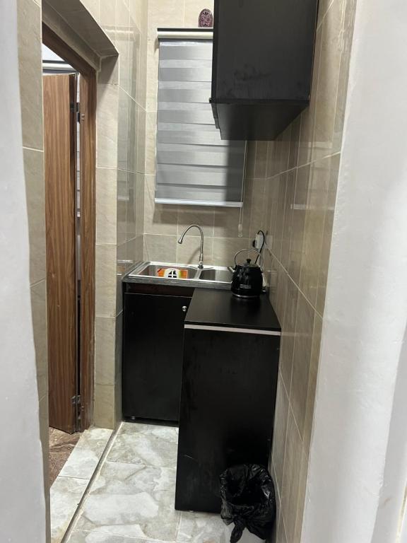 Kuchyň nebo kuchyňský kout v ubytování J Gibson Hotel