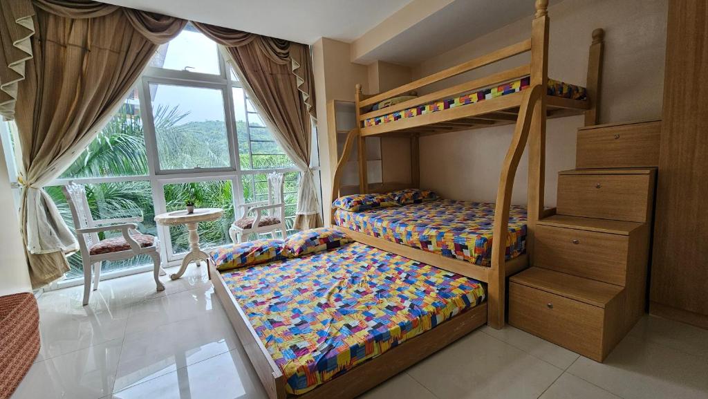 Postel nebo postele na pokoji v ubytování Myna Lagoon Pico de Loro
