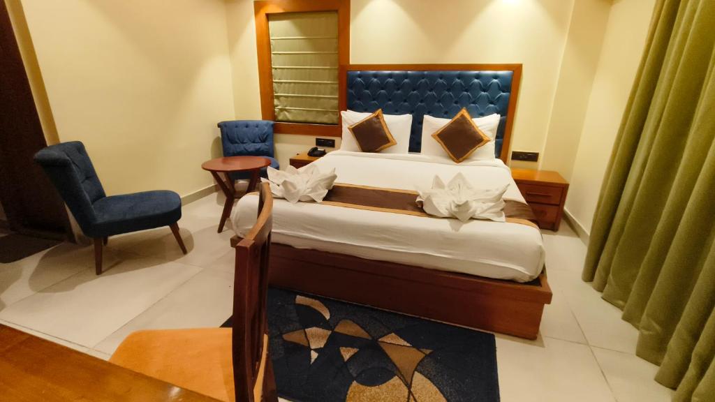 Postel nebo postele na pokoji v ubytování Luxury Amar Tree Resort