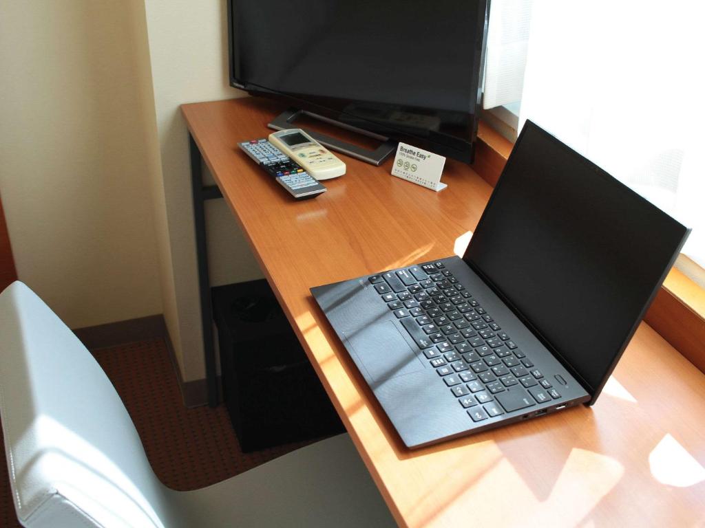 TV a/nebo společenská místnost v ubytování Comfort Inn Hitachinaka