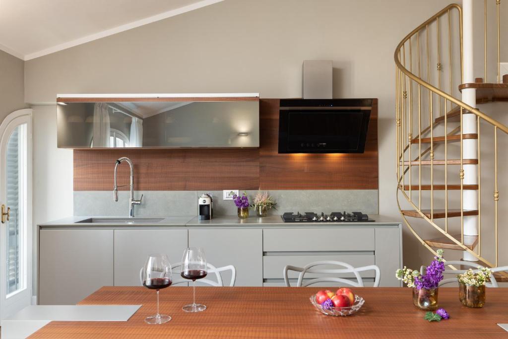 Kuchyň nebo kuchyňský kout v ubytování Torrigiani Apartments