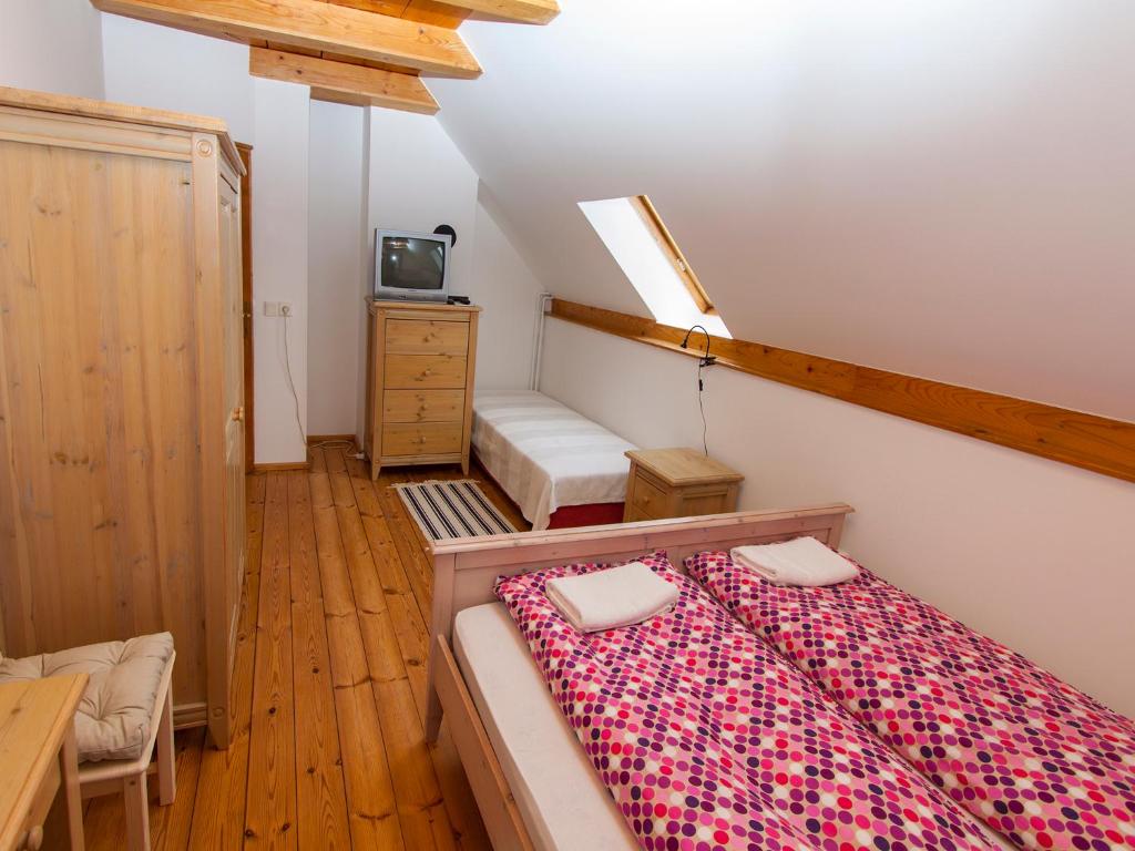 Postel nebo postele na pokoji v ubytování Amadeus Vendégház