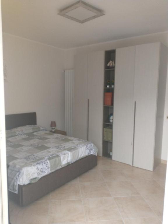 Postel nebo postele na pokoji v ubytování Carini house